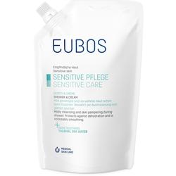 Weißer Beutel mit Eubos-Logo, enthält Duschcreme für empfindliche Haut.
