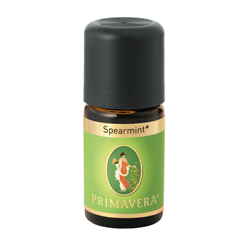 Kleines Glasfläschchen mit grünem Etikett, darauf steht "Spearmint" und "Primavera".